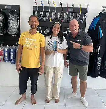 award given by Andy Auer PADI regional manager to Joe and Jen