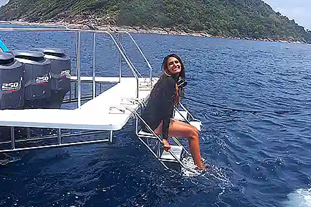 guest stting on the dive platform