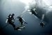 divers on buoy line